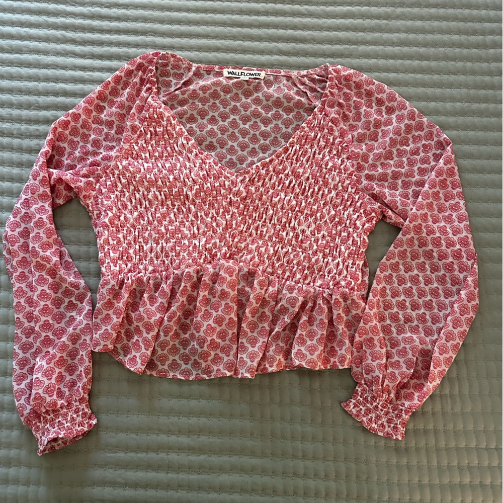Pink and white print blouse